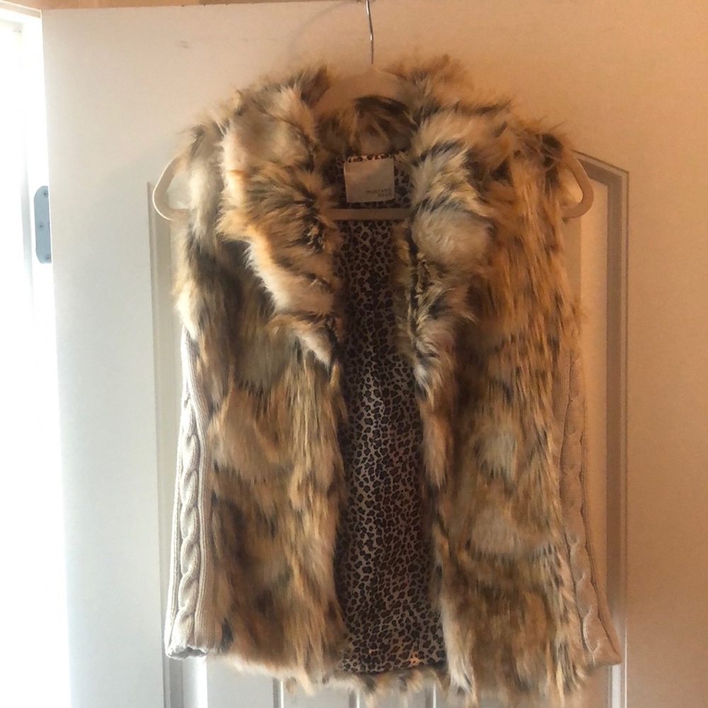 Boutique style animal print fur vest.